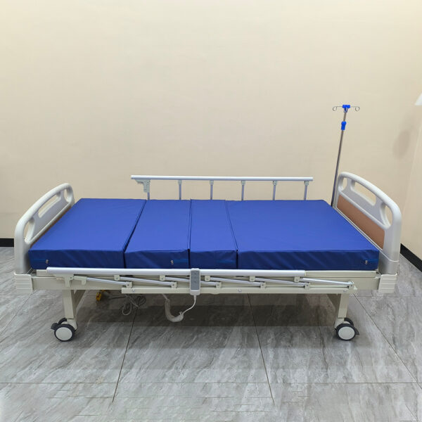 electric hospital bed with IV pole
